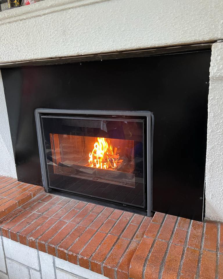 Insert à bois installé à Castillon-la-Bataille — chantier Le Cœur du Foyer